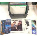 A selection of 30 1980's LP's and 12 inch singles in record case