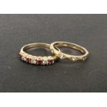 A 9 carat hallmarked gold ring set 3 diamonds and 4 rubies, size M; a small gem set eternity ring,