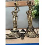 A pair of classical style Tiffany lamps with female pillars with floral shade