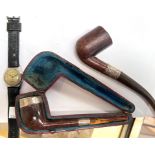 A silver mounted pipe, amber mouthpiece, cased; another pipe; a 1930's gent's Dominant mechanical