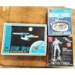 Three vintage Star Trek un-assembled model kits in original boxes, 'amt U.S.S Enterprise Bridge', '