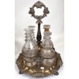 A 19th century 4 division hallmarked silver decanter stand with central handle, relief border and