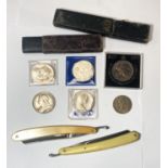 A Victorian 1895 crown; 4 modern commemorative crowns; a compact; 2 cutthroat razors