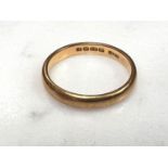 A 22 carat hallmarked gold wedding ring, size N/O, 4.1gm