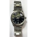 A Rolex Oyster Perpetual Air-King wristwatch with stainless steel case and bracelet, black dial,