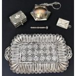 A hallmarked silver powder puff compact with mirror, hallmarked silver stamped purse, a white