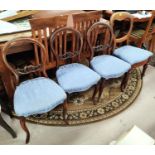 A Victorian set of 3 balloon back dining chairs with blue drop in seats, plus 2 similar chairs