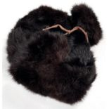 A Russian "bearskin" hat with badge.