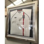 A signed framed England Football Shirt, Star Wars VHS, Chinese stress balls etc