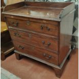 A 19th century Sheraton style bachelors chest of 3 drawers, inlaid and crossbanded, with raised
