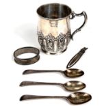 A hallmarked silver christening mug, Sheffield 1897; 3 hallmarked silver teaspoons and a napkin