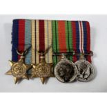 A set of 4 WWII miniature dress medals