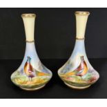 A pair of Locke & Co Worcester slender neck posy vases decorated with pheasants signed W Stinton,