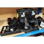 A Singer 221K boxed sewing machine and accessories