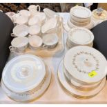 A selection of gilt and white dinner ware mixed sets including Royal Worcester, Ridgeways's