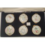 A boxed set of 6 Royal Doulton miniature enamel boxes decorated with Beatrix Potter characters