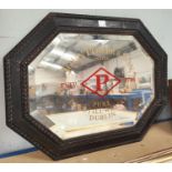 A John Power and sons oak framed advertising mirror