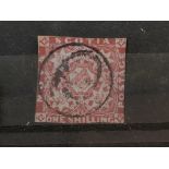 A Nova Scotia One Shilling Purple postage stamp 1857