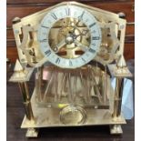 An early 20th century Brass Congreve clock with rolling ball Fusee movement of small proportions