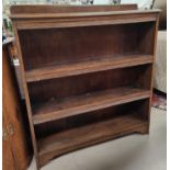 A 1930's 3 height oak bookcase, width 105cm