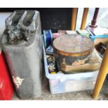 A selection of vintage tins and an American petrol can