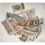 A quantity of world banknotes, including monies from Europe, South America, India, etc