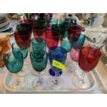 A selection pf antique cranberry, green and other glassware