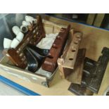 A selection of clay pipes and accessories, stands etc