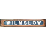 A painted pine Wilmslow sign in blue and white