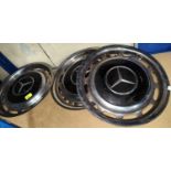 A set of four vintage Mercedes chrome hub caps, diameter 39cm