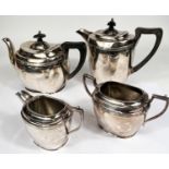 A 4-piece silver plated tea service with ebonised fittings;