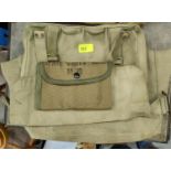 Two military canvas bags, a spare parts roll
