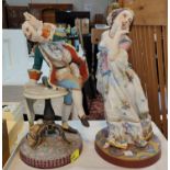 Jean Gille: A pair of 19th century French ceramic figures, male and female eating fruit (man a/f)