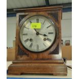 An early 20th century mantel clock with striking 8 day movement, mahogany case, 27cm high