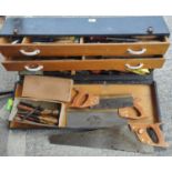 A vintage tool box with contents, good quality workman's tools including Spear & Jackson saws,