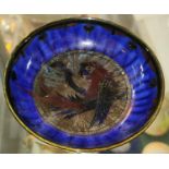 An unusual Royal Lancastrian dish with Macaw parrot central decoration to blue ground with signature