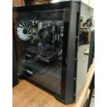 A Corsair CV550 Geoforce RTX Zota gaming pc with a large Samsung curved monitor, 28" screen