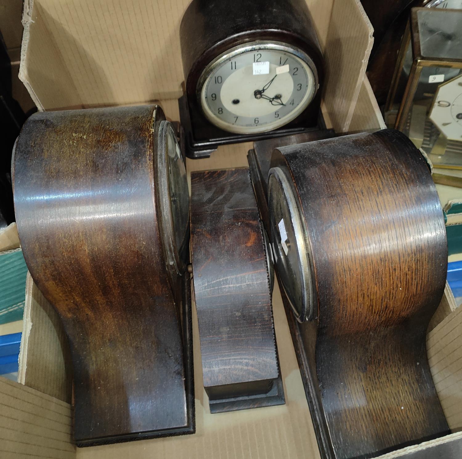 Three 1930's mantel clocks with strike; a similar smaller in beaded oak case