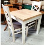 A modern wood effect and white extending kitchen table and 2 chairs