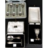 A cased set of 6 chased hallmarked silver teaspoons, Sheffield 1902; a cased child's dish and spoon