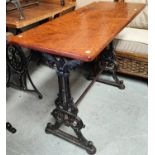 A 19th century cast iron based rectangular pub table, lyre supports, 44x106cm