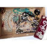 A selection of costume jewellery:  diamante collar; millefiori bead necklaces; etc.