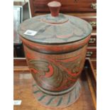 A Scandinavian carved wooden lidded pot with gilt and red painted decoration, height 43cm