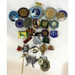 A collection of 20 enamelled badges