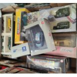 A selection of boxed diecast vehicles, cars and bikes etc