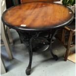 A 19th century cast iron based 'Britannia' circular pub table, with shelf bellow, diameter 69cm