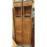 A modern pine 4 piece bedroom suite comprising gents' double door wardrobe, dressing tale, stool and