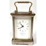 A modern brass carriage clock by Garrard & Co. London.