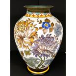 Royal Gouda: Chrysanthemum Vase scrolling flowers, signed and titled to base, height 34cm.