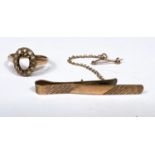 A 9ct hallmarked gold tie clip; a yellow metal dress ring st. 9ct (stone missing), 4gm